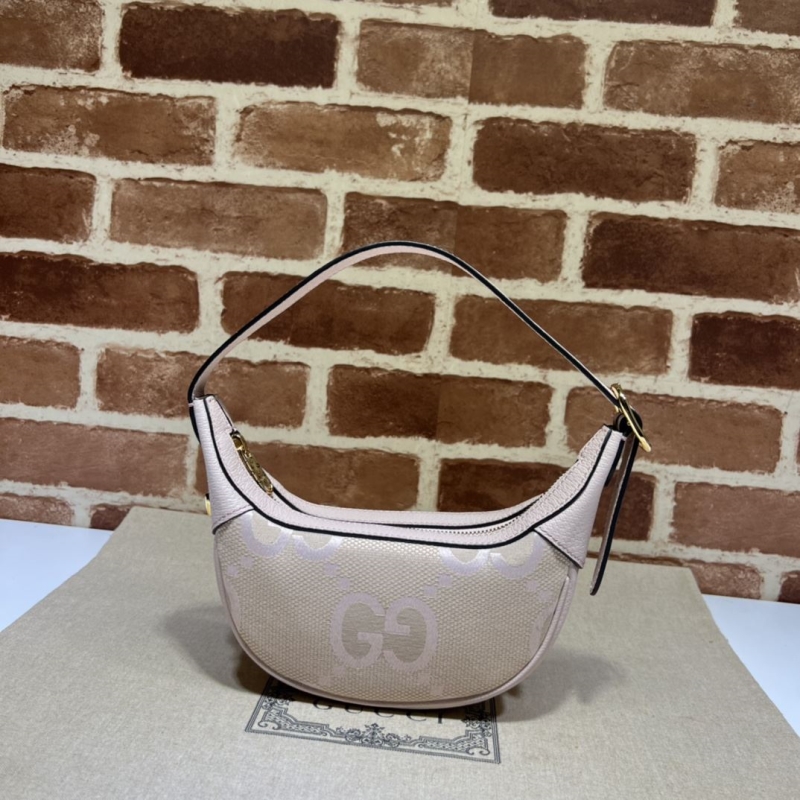G*u*i top handle bags